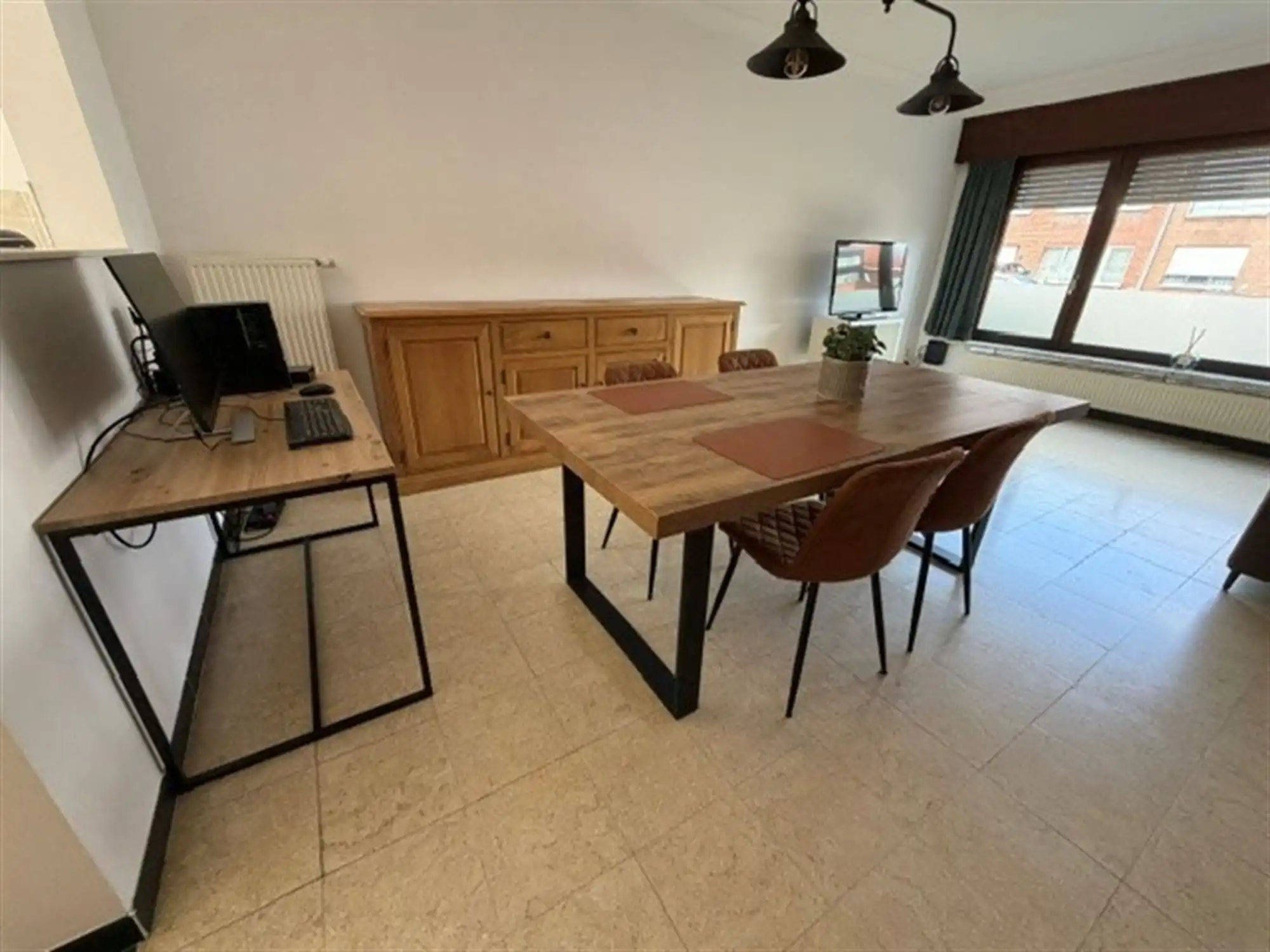 Zeer tof gelijkvloersappartement met tuin en garagebox foto 6