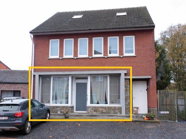 Knus gelijkvloers appartement met tuin  foto {{pictureIndex}}