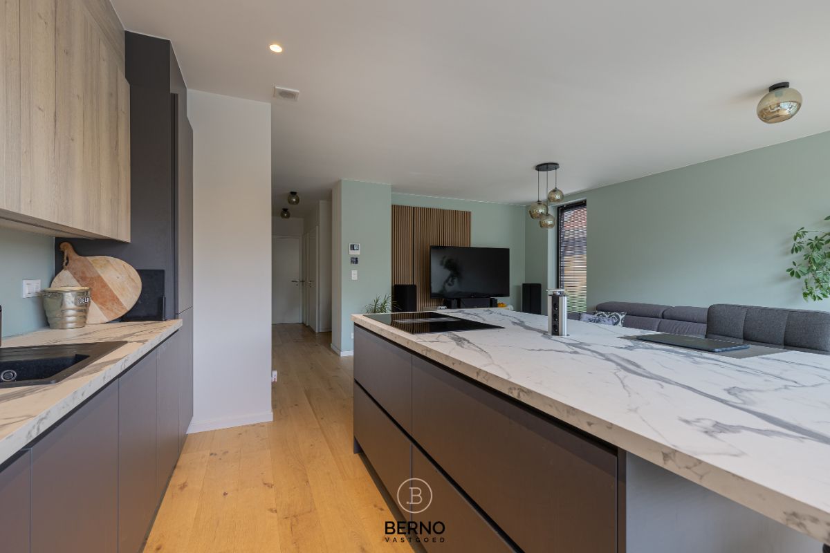 Recent gelijkvloers appartement met zonnig terras en tuintje in Opstal foto 6