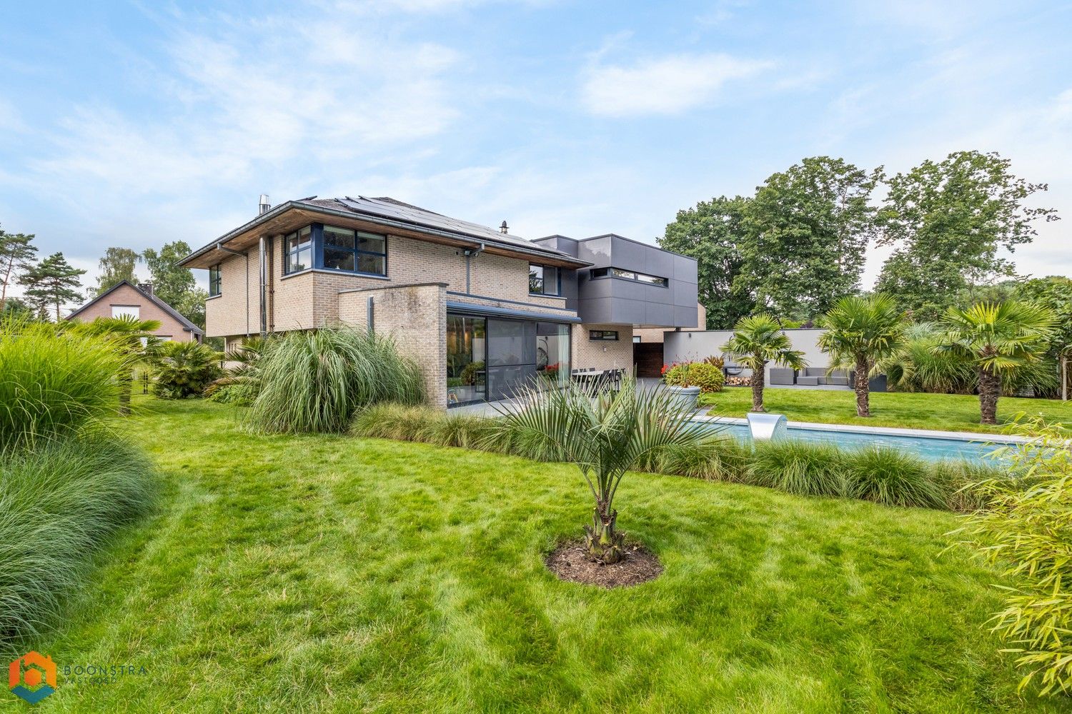 Energiezuinige villa op 1.636 m² met zwembad, lounge-ruimte en tropisch aangelegde tuin in Tremelo foto 2