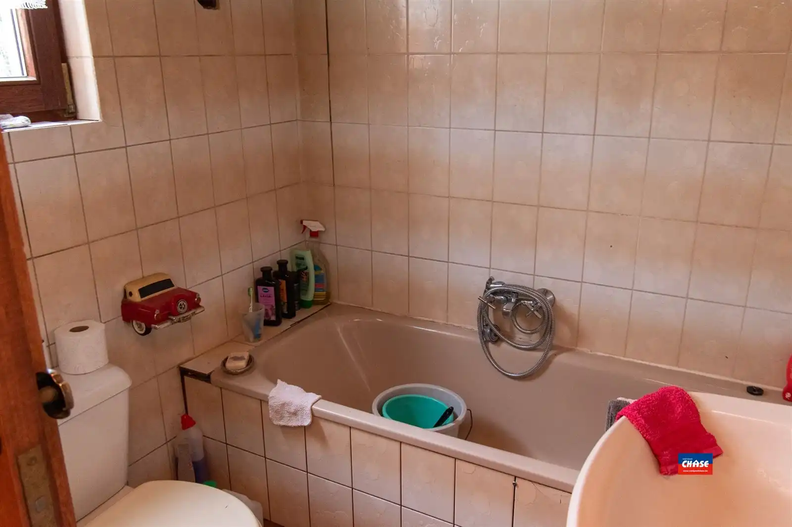 Te renoveren rijwoning met magazijn foto 5