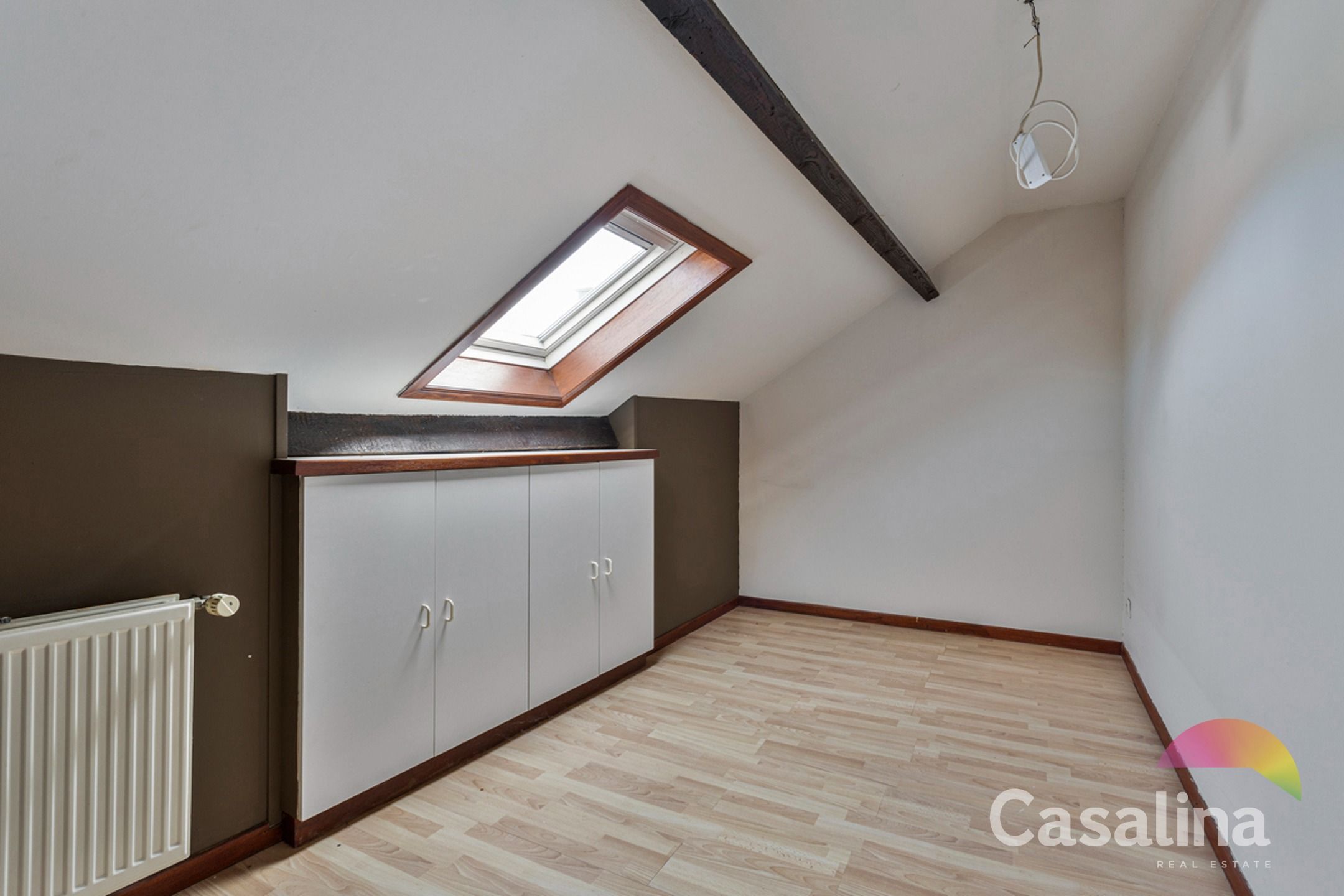 Een ruime te renoveren rijwoning van 207m² met zonnig terras foto 16