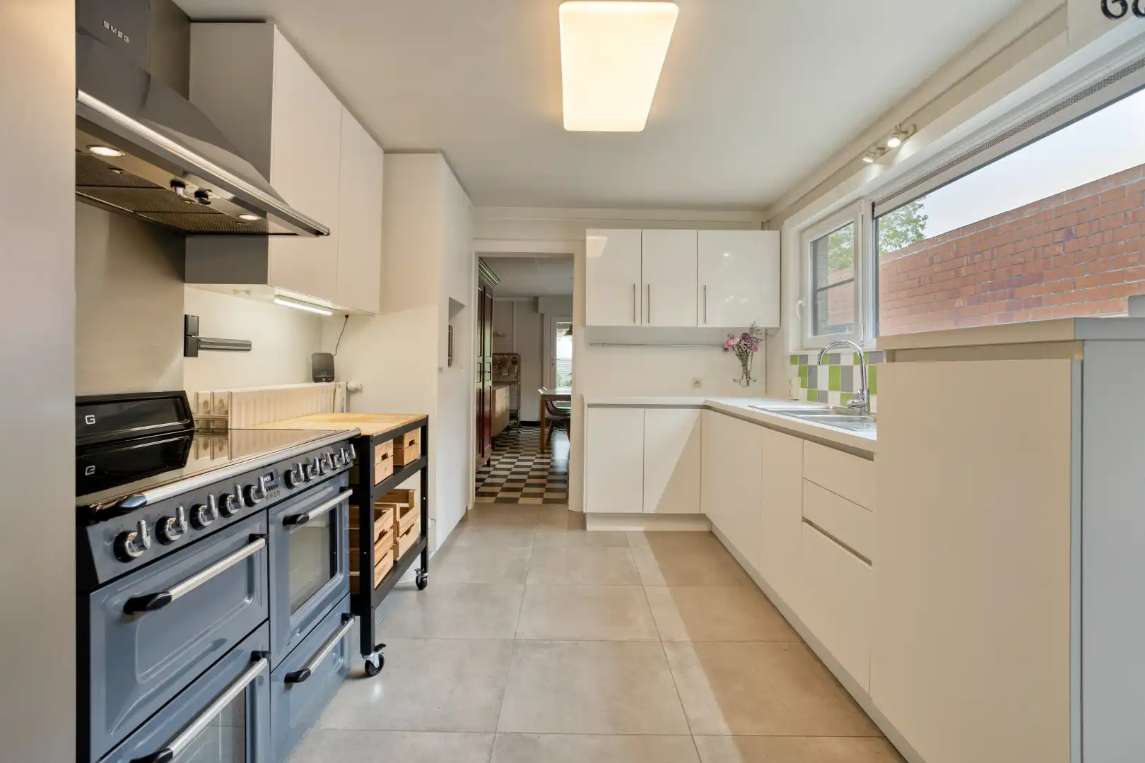 Zeer ruime gerenoveerde woning met 3 à 4 slaapkamers en garage! foto 7