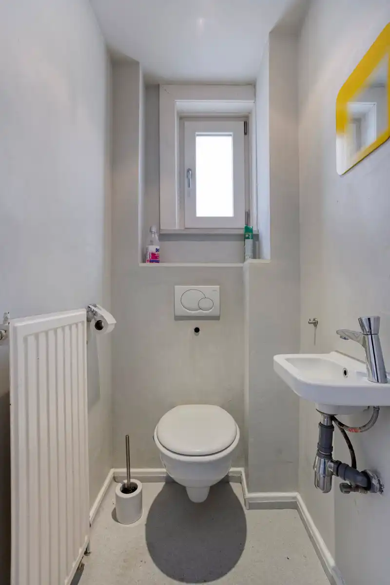 Goed gelegen woning met 4 slaapkamers, tuin en garage foto 5