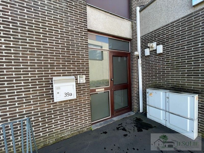 Handelspand + ruim appartement  met potentieel foto 6