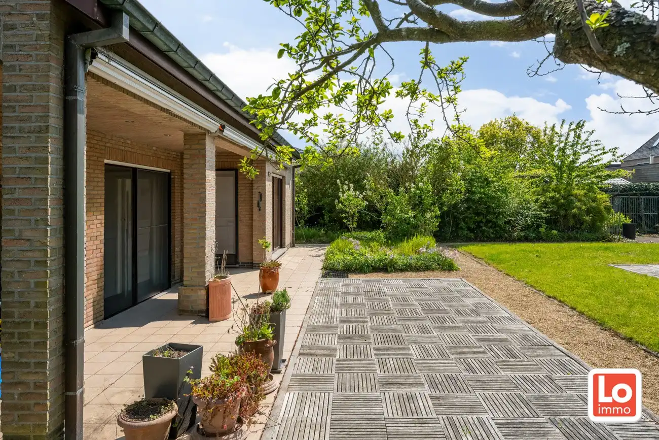 Ruime en degelijke open woning met inpandige garage en gezellige zuidwest georiënteerde tuin op een rustige locatie nabij het centrum van Lochristi! foto 31