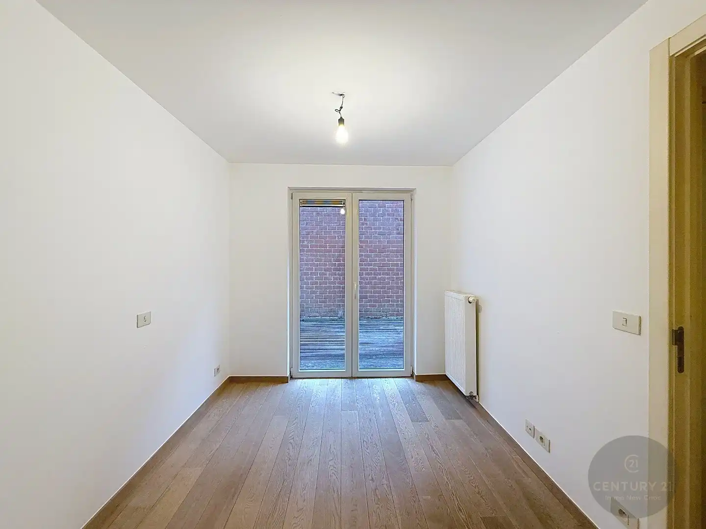 2 slaapkamer appartement met koer en garagestaanplaats foto 7