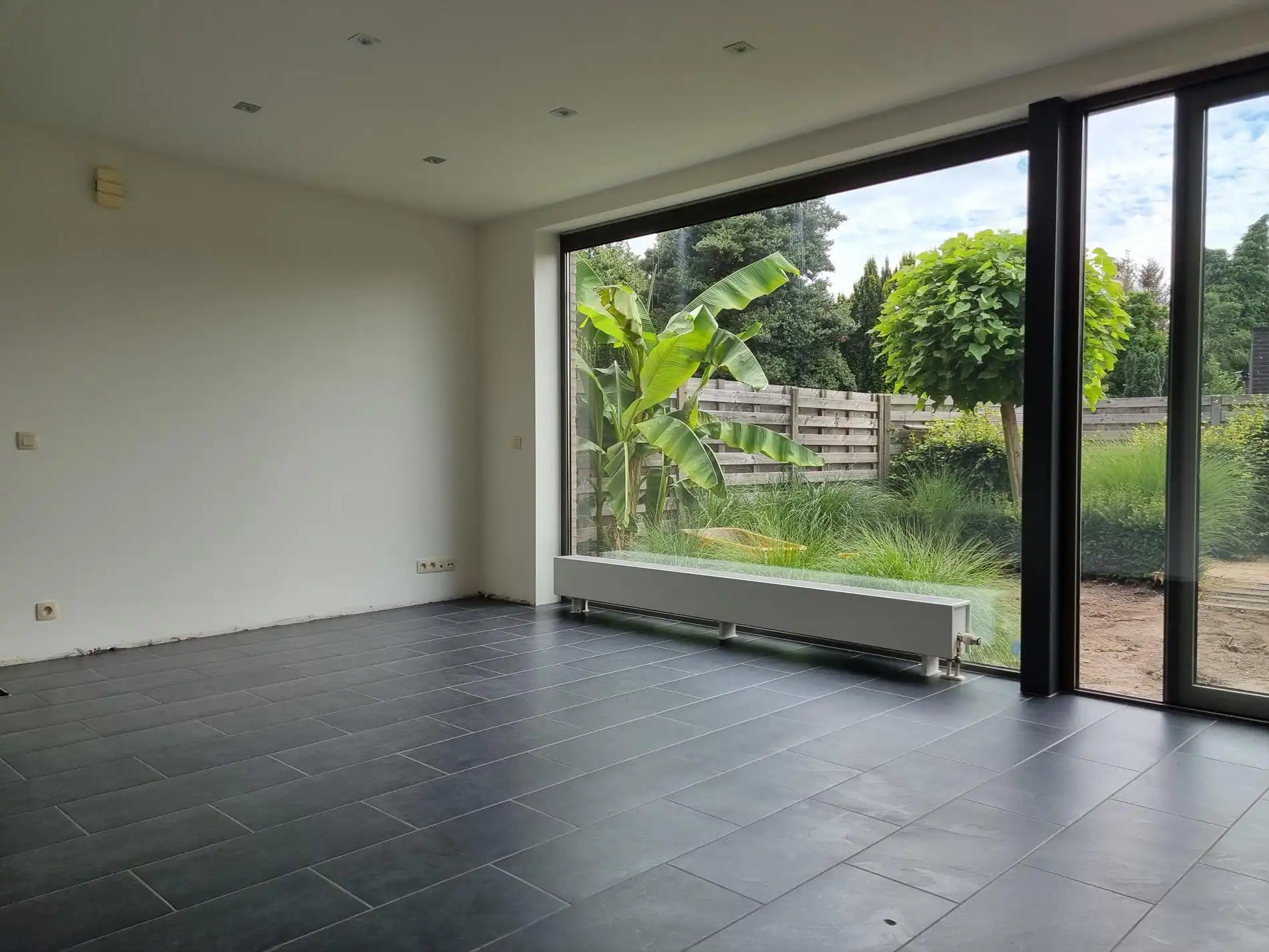 Knap gelijkvloers éénslaapkamerappartement met tuin en garagebox. foto 9