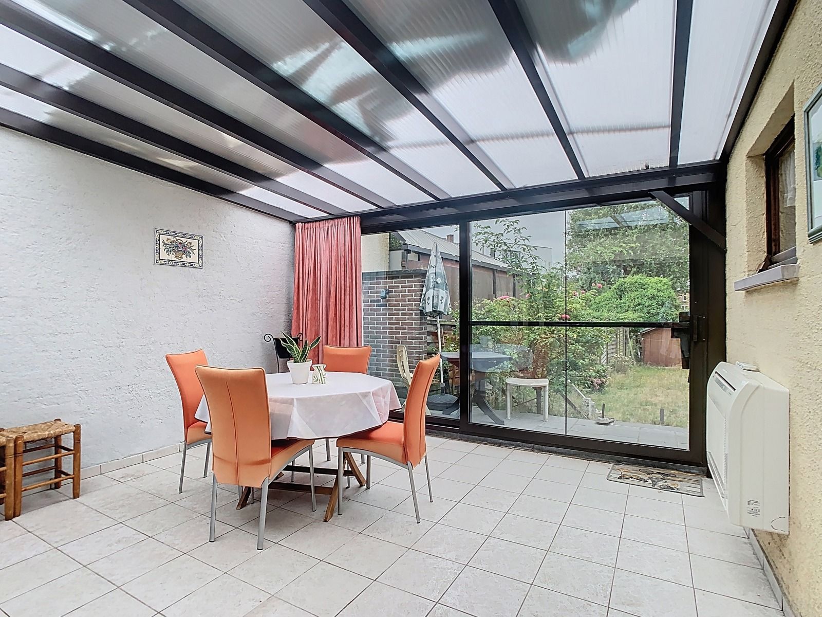 Centraal gelegen rijwoning met 2 SLPK én mooie stadstuin! foto 16