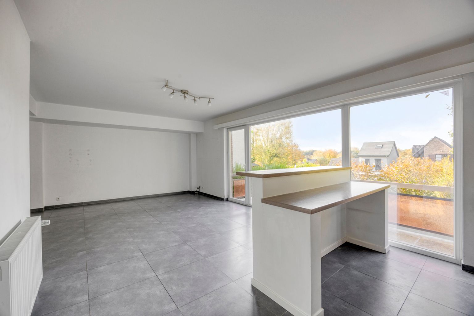 Instapklaar gelijkvloers appartement met eigen tuin foto 8