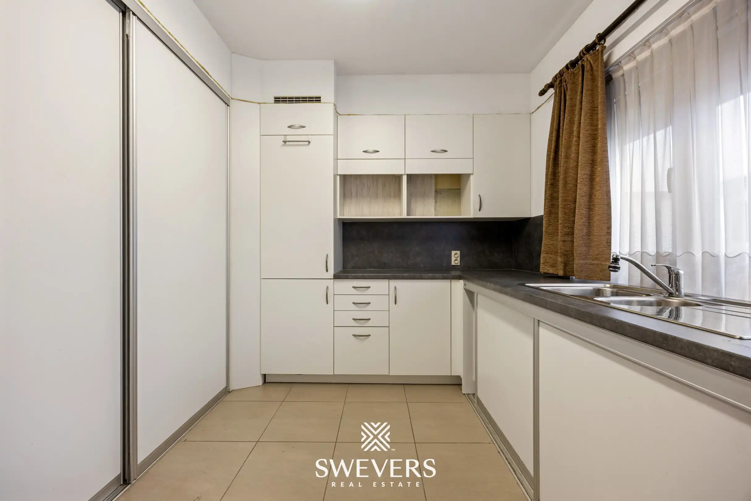 Ideale starterswoning met 4 slaapkamers op zonrijk perceel foto 10