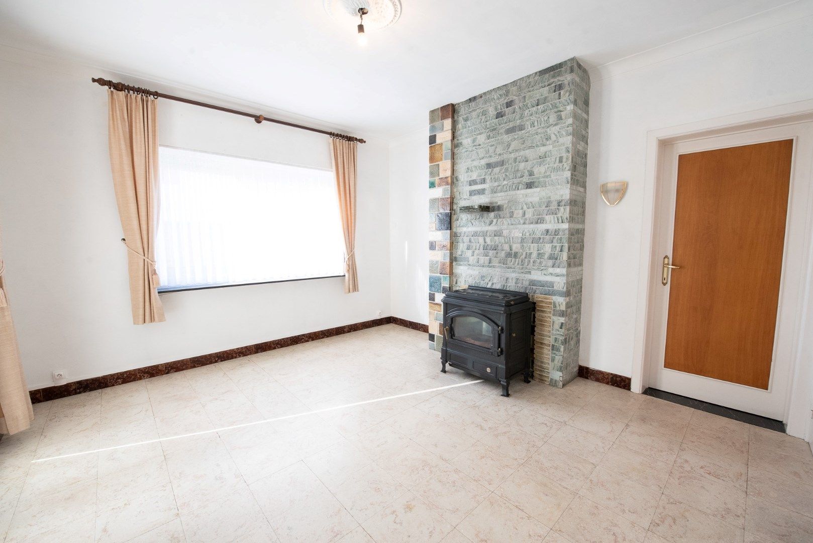 Proper onderhouden woning met 3 slaapkamers en ruimte tuin te huur in Zulte foto 4