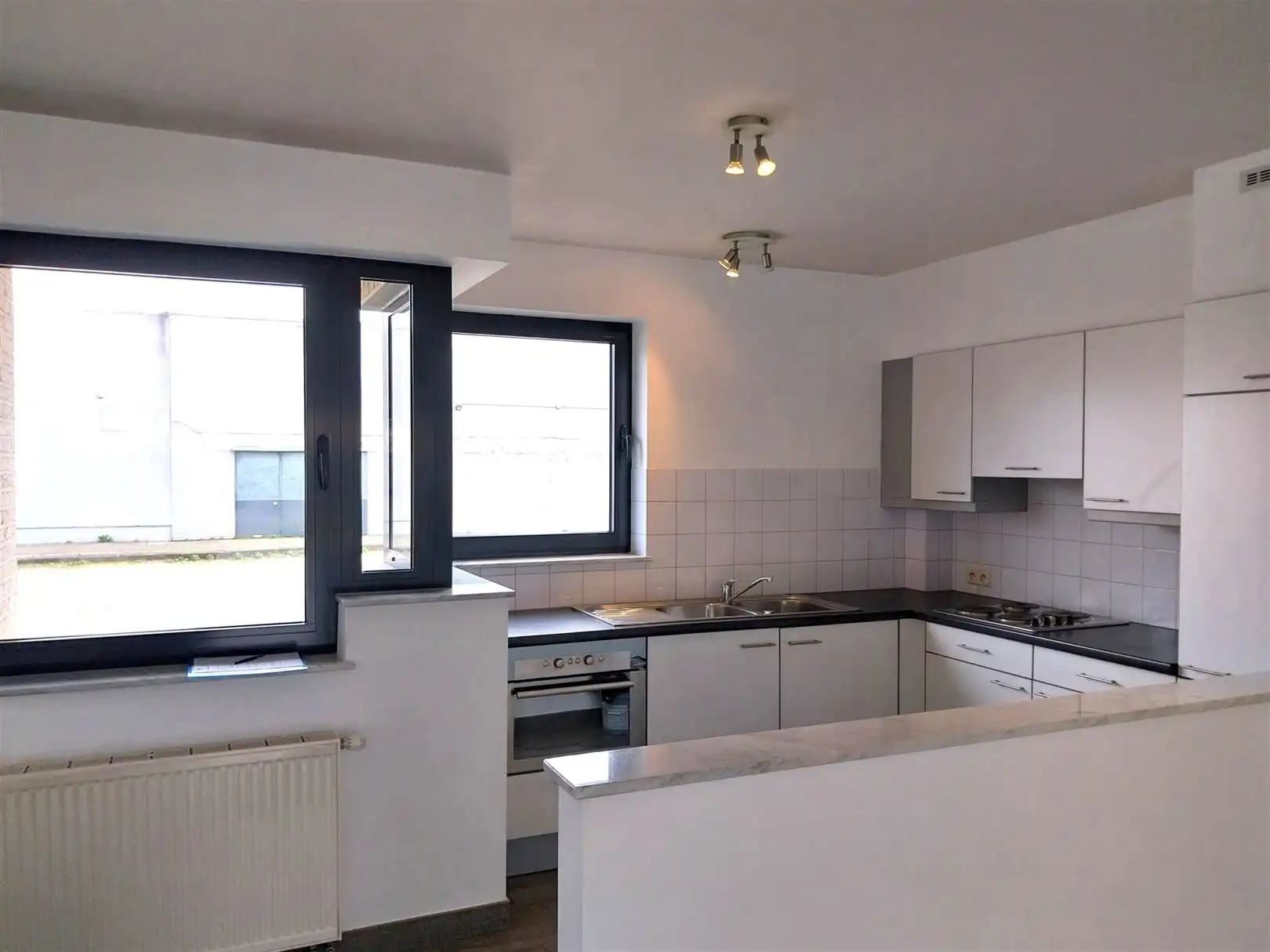 TE HUUR: Gelijkvloers appartement met 3 slaapkamers in Heusden-Zolder! foto 6