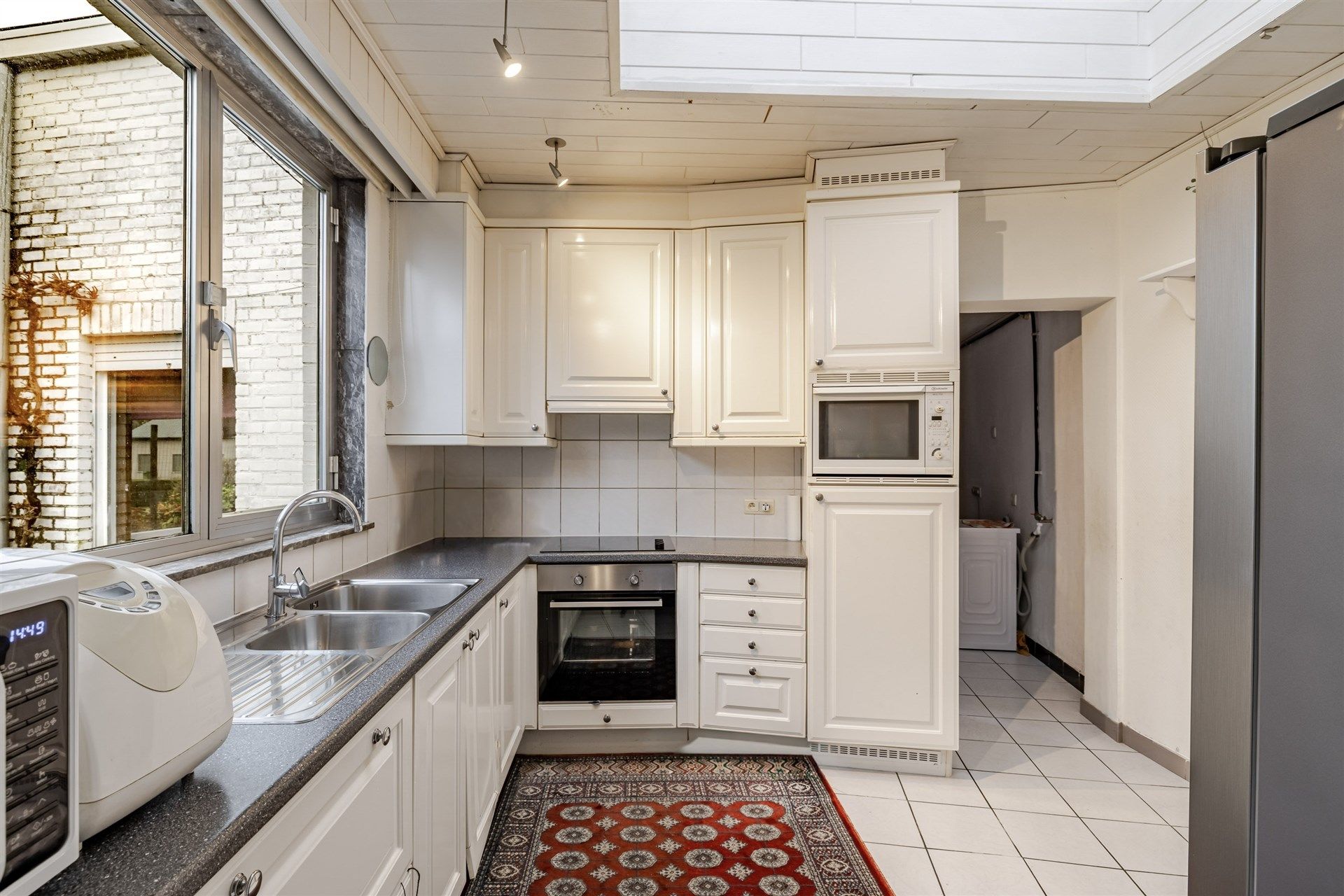 Ruime woning met 3 slks, grote tuin en garage foto 9