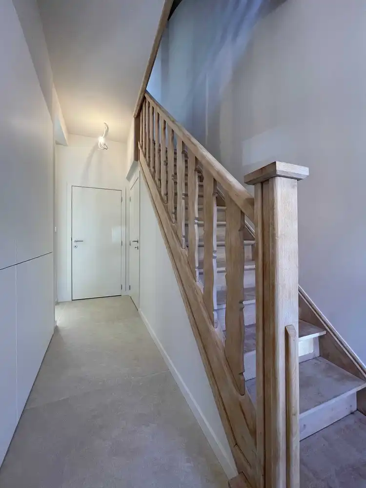 Smaakvol gerenoveerde woning met stadstuin foto 18