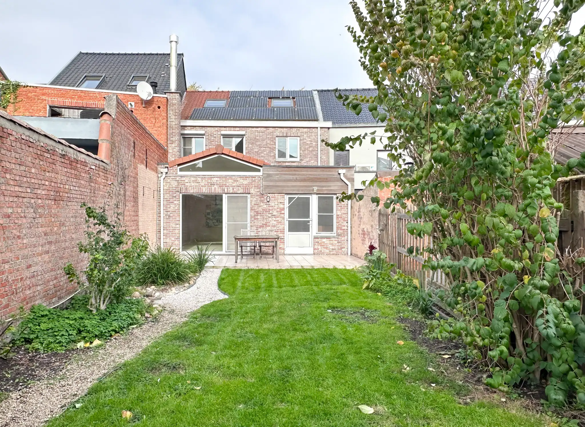 Woning met twee slaapkamers, dressing, garage en tuin te huur in het hartje van Melsele foto 17