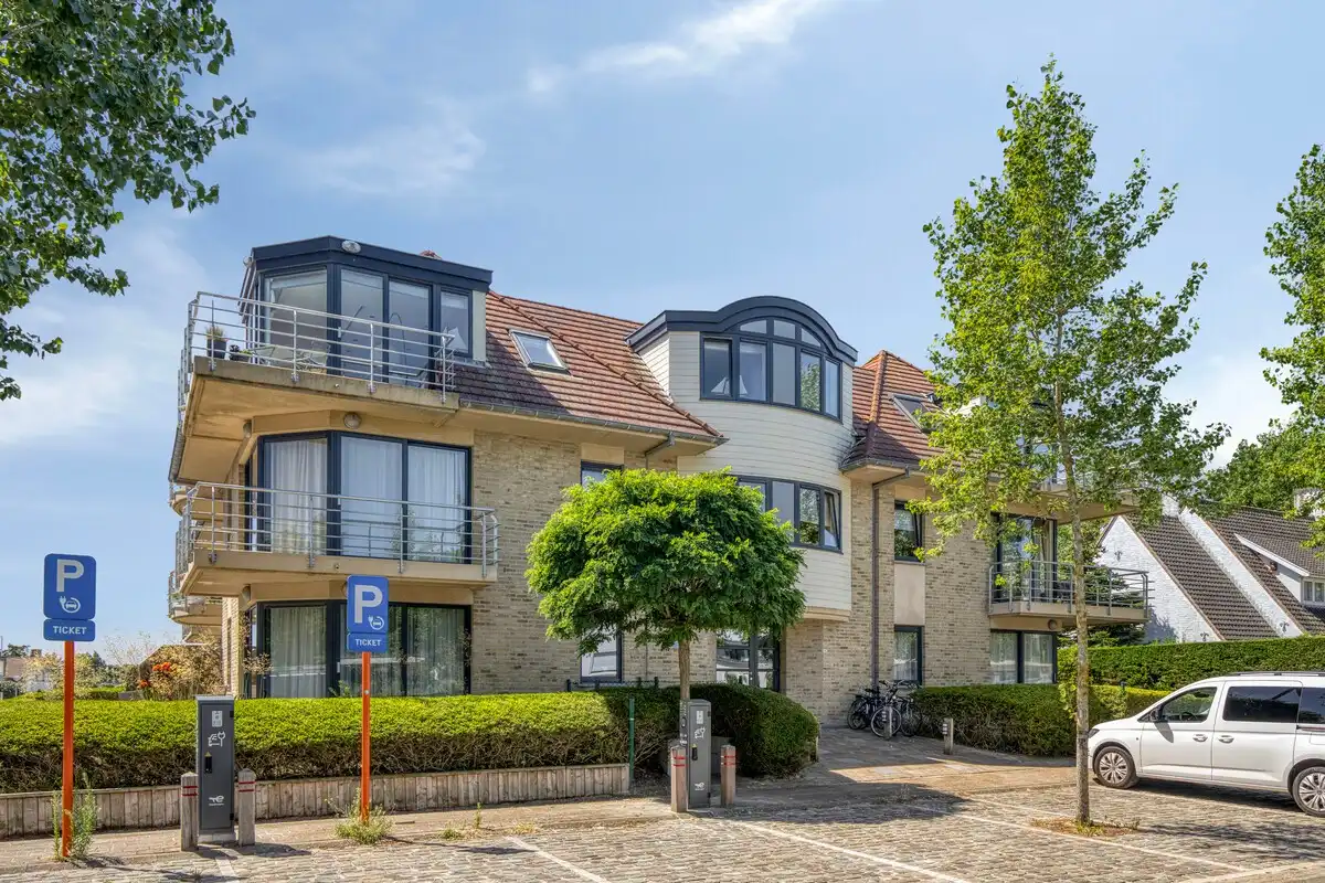 Zongericht appartement met 2 slaapkamers en aankoopmogelijkheid van een garage! foto {{pictureIndex}}