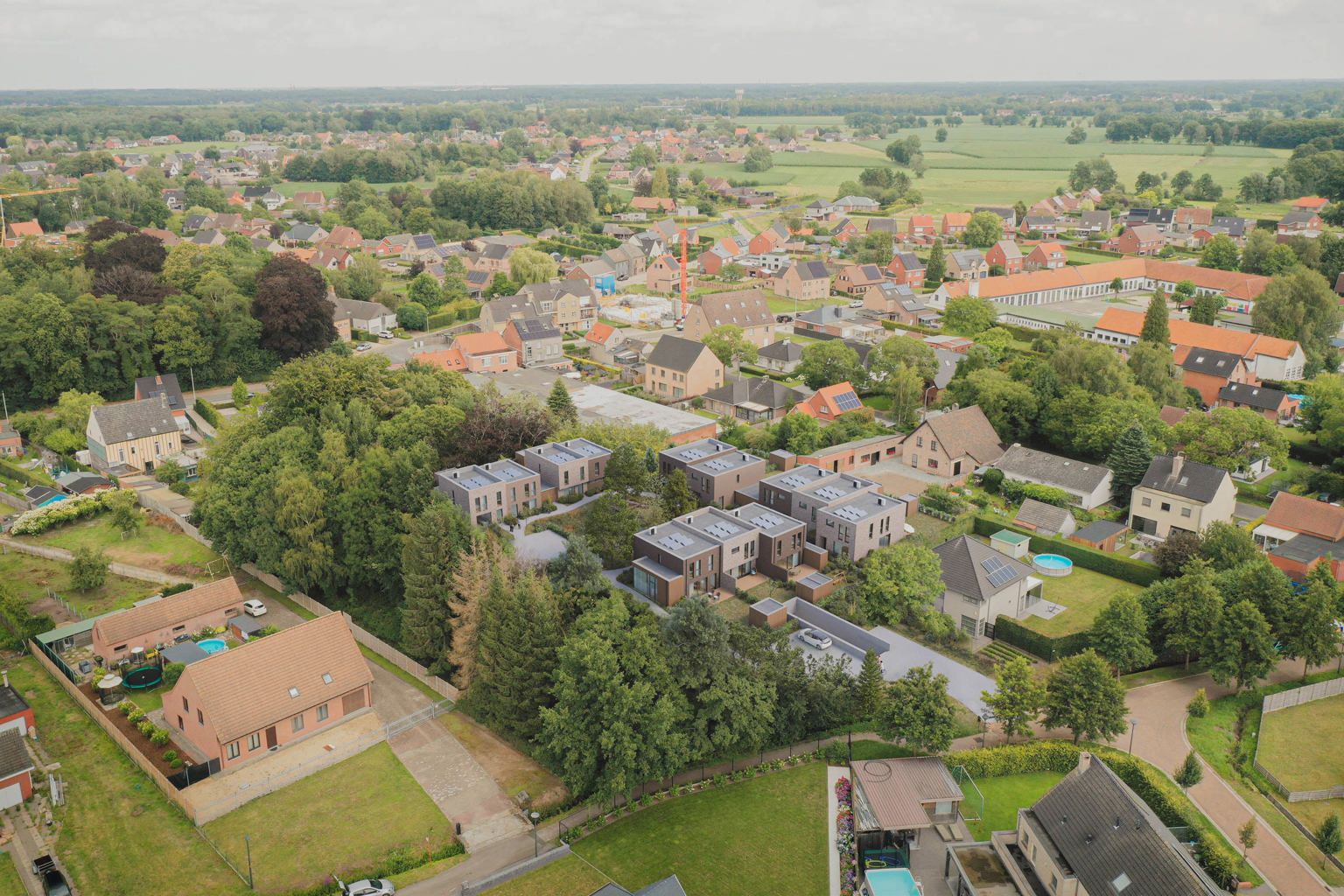 Woonerf met 12 doorzonwoningen en een centrale binnentuin foto 2