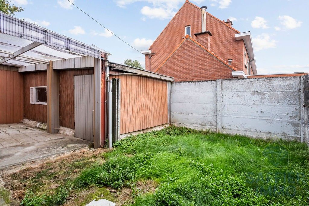 Halfopen bebouwing met zonnige tuin en 2 garages in rustige wijk te Izegem foto 23