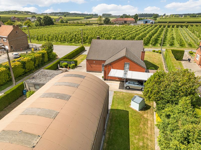 Ruime woning met loods op een perceel van 14are foto 41