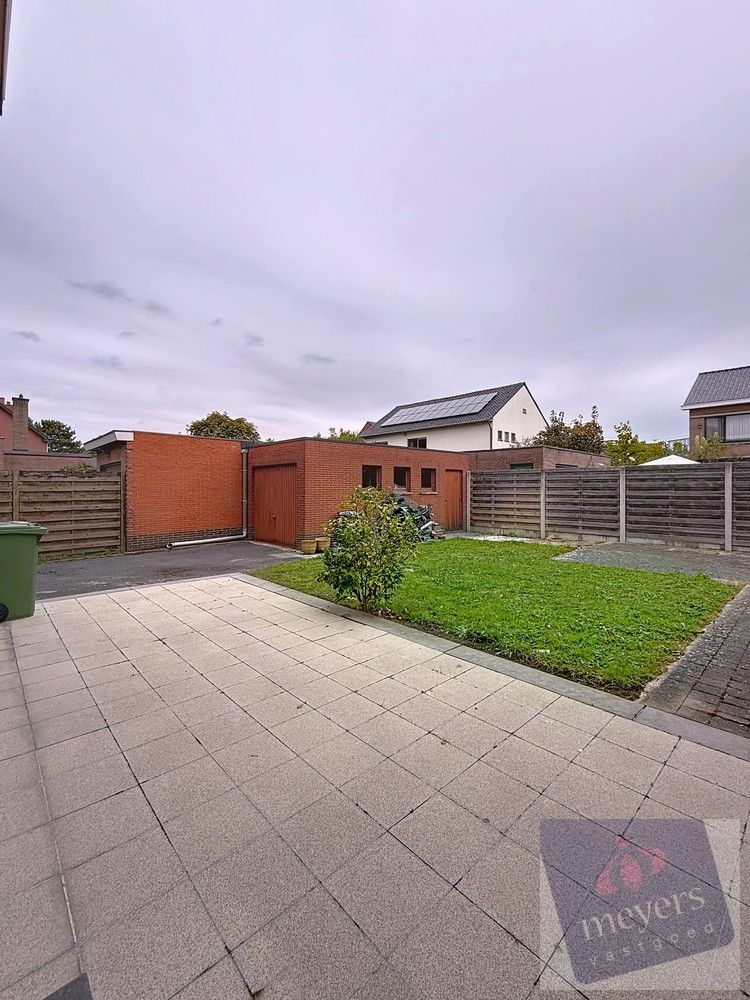 Ruime halfopen gezinswoning met tuin en garage in Hasselt foto 4
