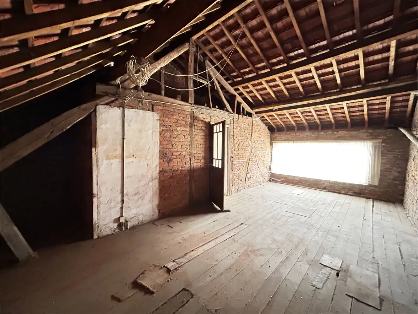 Te renoveren handelshuis met woonst foto 37