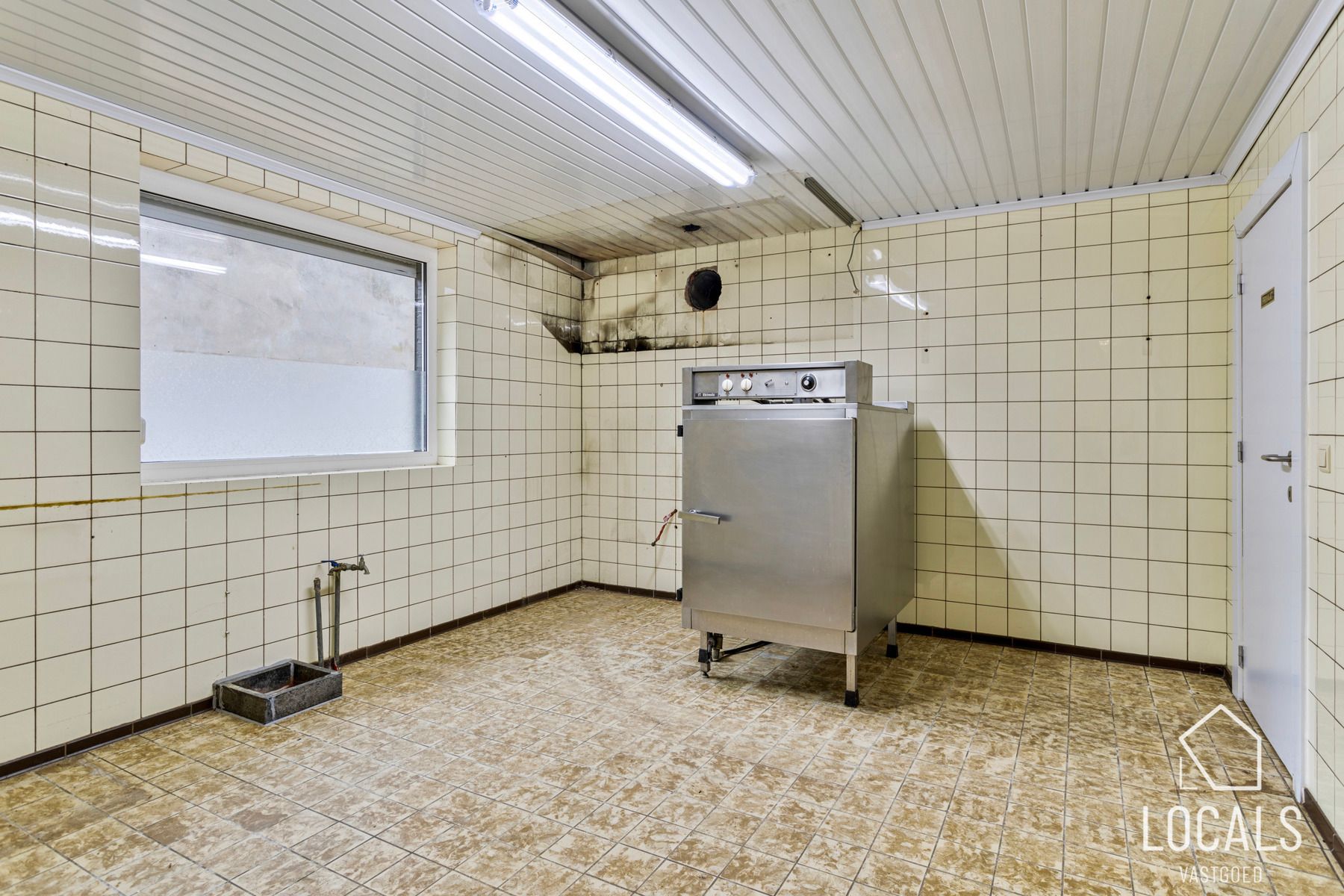 Veelzijdig pand: handelsruimte met woonst & parkeerplaatsen foto 7