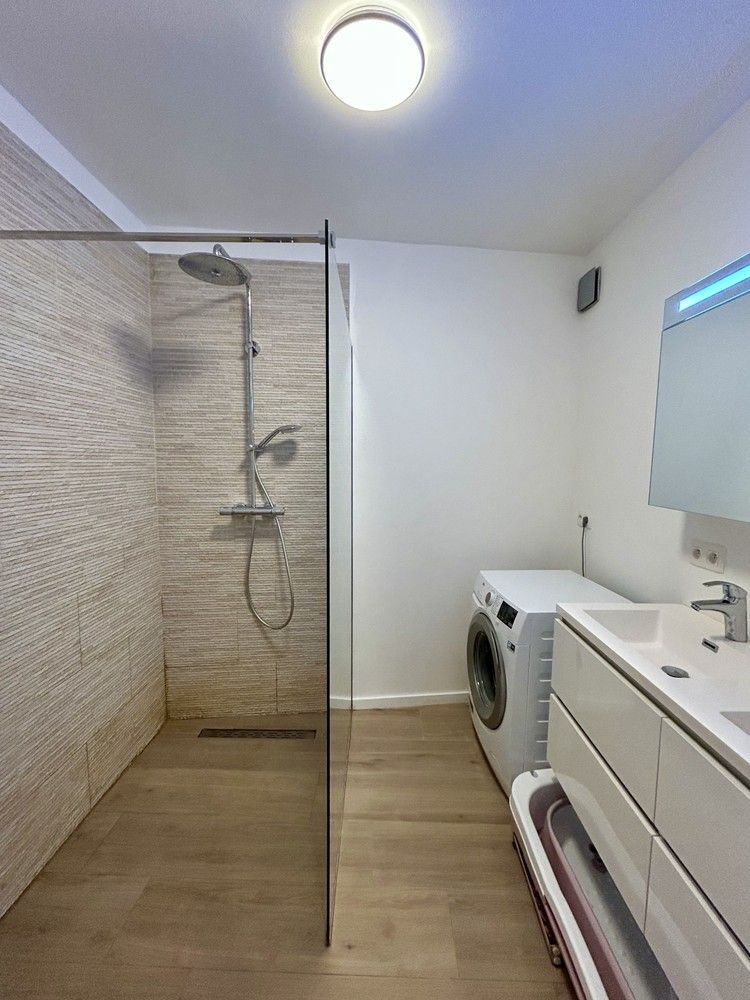 Instapklaar 3-slaapkamerappartement met terras in hartje Leuven foto 17