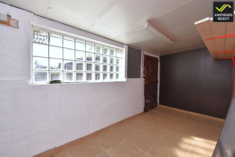 Vastgoed Select: Rijwoning met westgerichte tuin, open zicht, garage en 2 slaapkamers in Eeklo foto 13