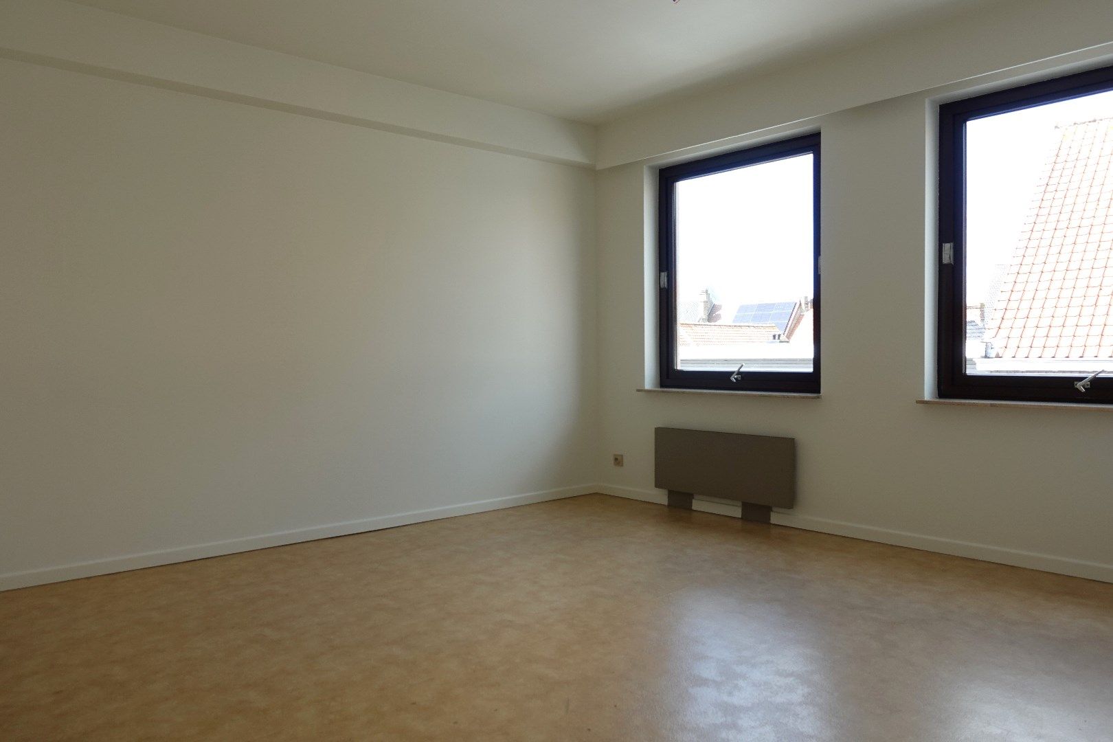 Opbrengsteigendom met 7 appartementen, 2 handelspanden en 7 garageboxen in Gistel foto 19