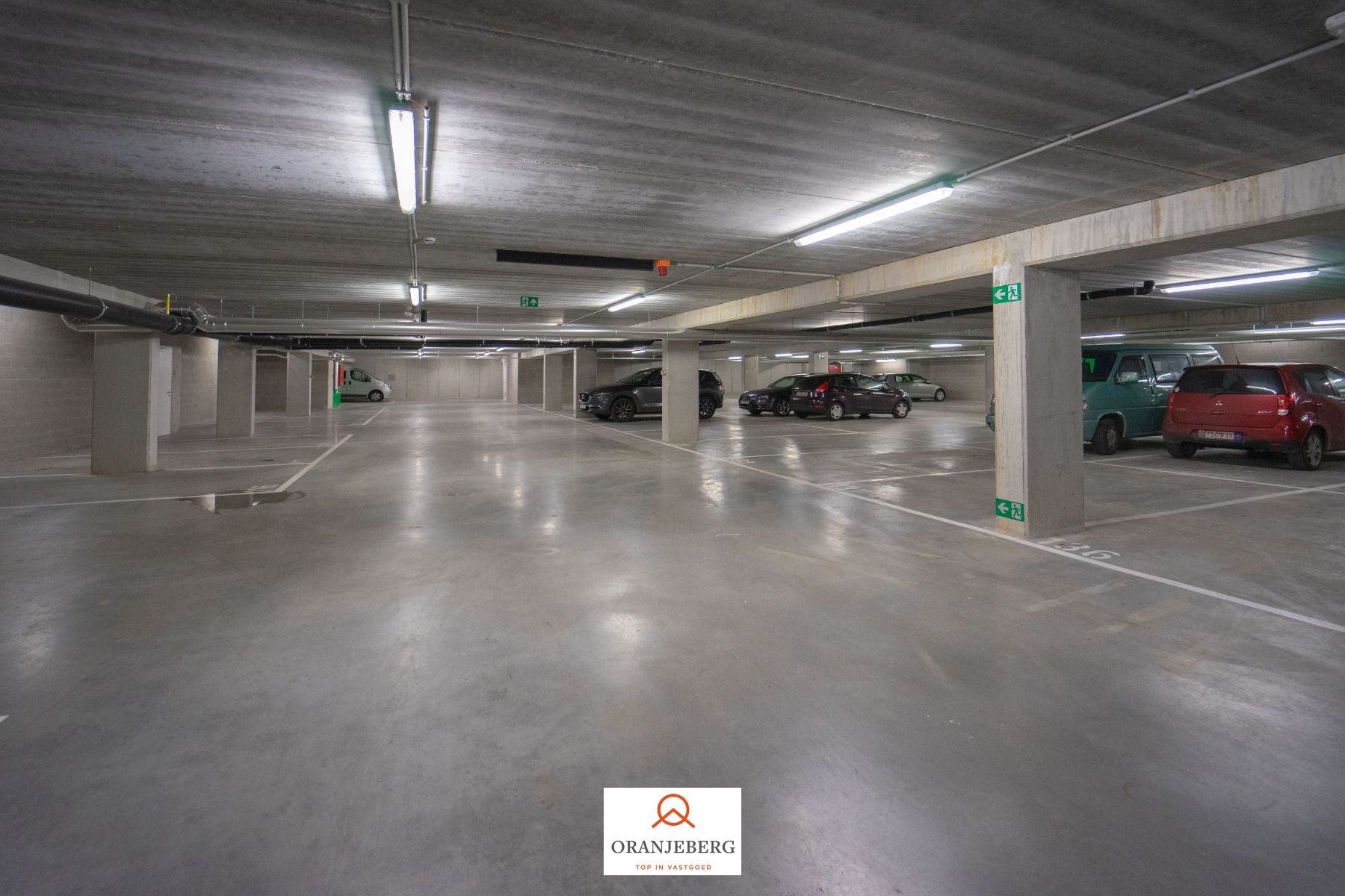 Nieuwbouw autostaanplaats te huur in afgesloten parkeergarage nabij Gent centrum foto 6