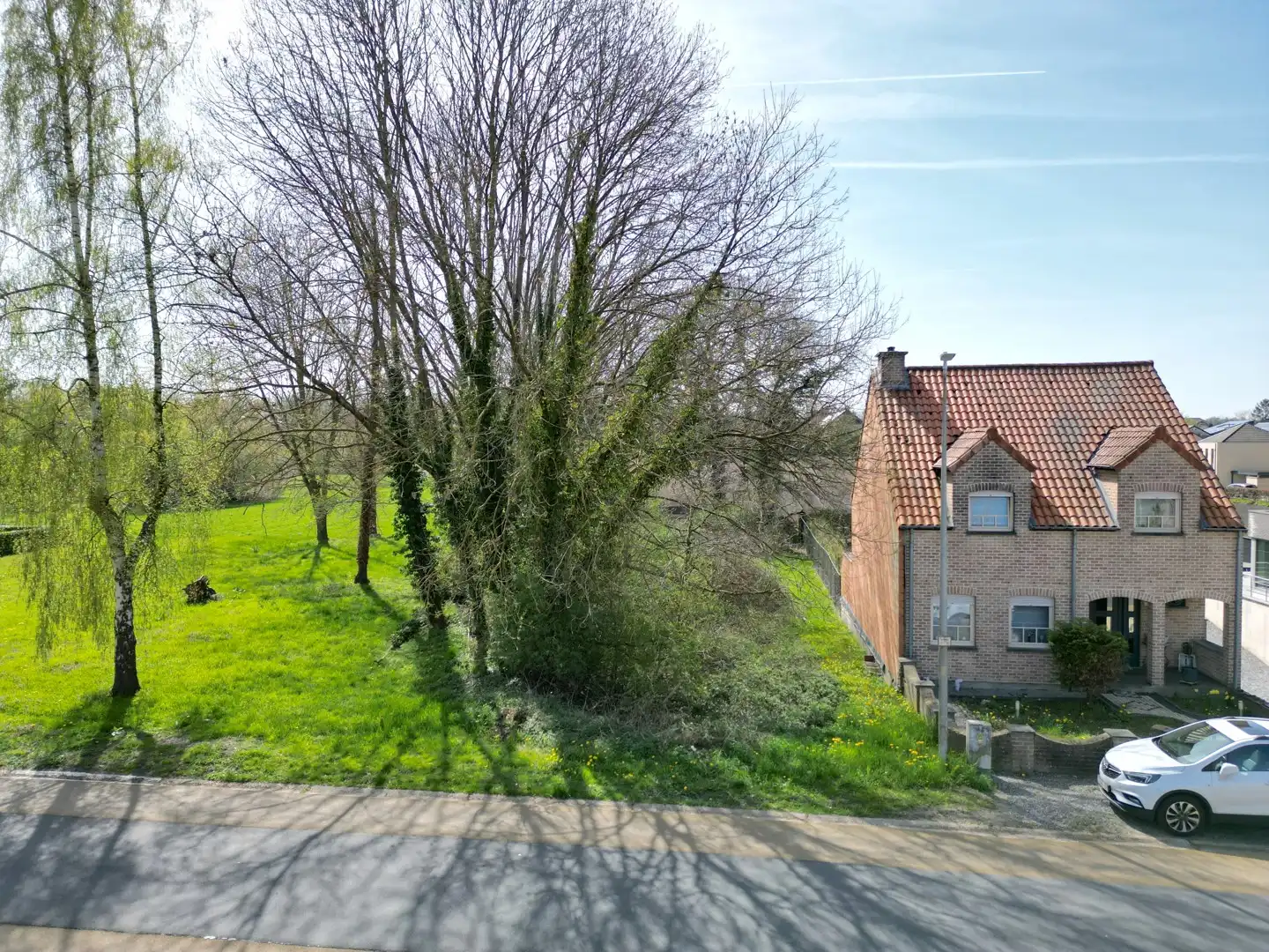 Zuid-west georiënteerde bouwgrond (Half-open) van 6a 45ca op een toplocatie in As foto 3