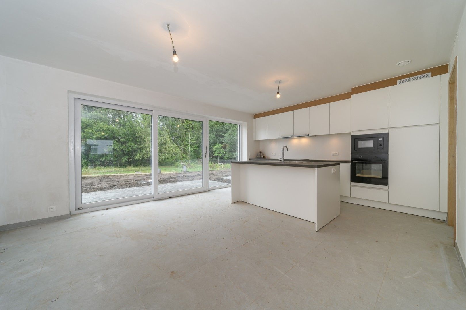 Gesloten bebouwing met tuin te Haaltert foto 5