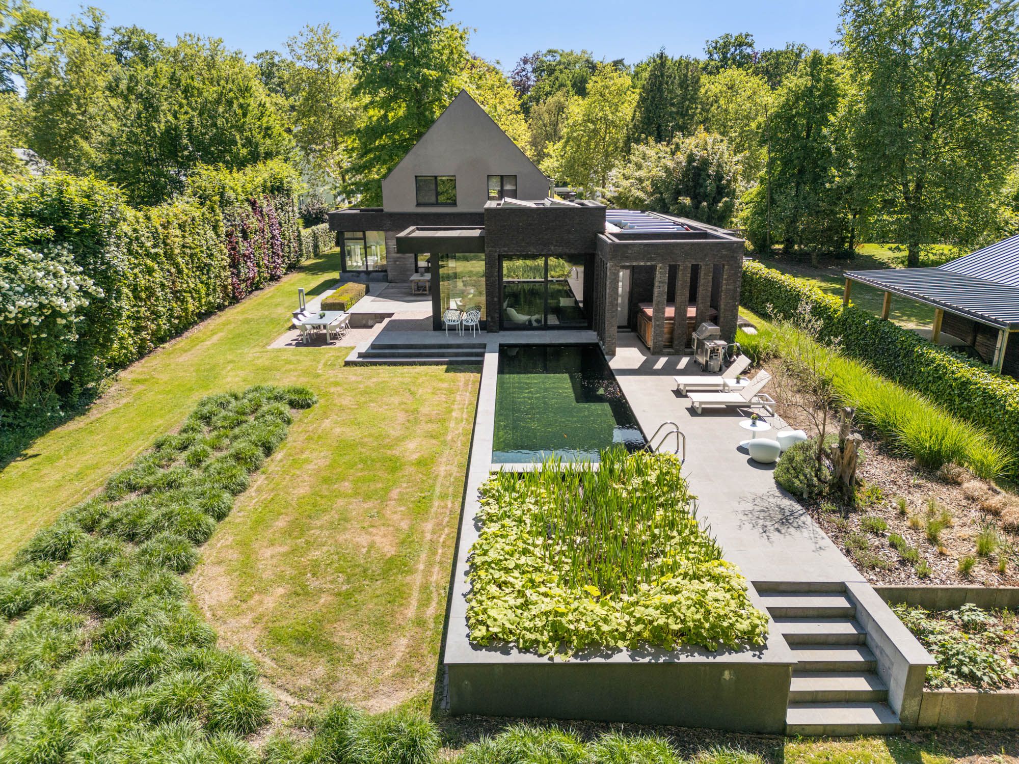 Exclusieve villa met tijdloze klasse, zwemvijver en zicht op groen te Hasselt ! foto 28