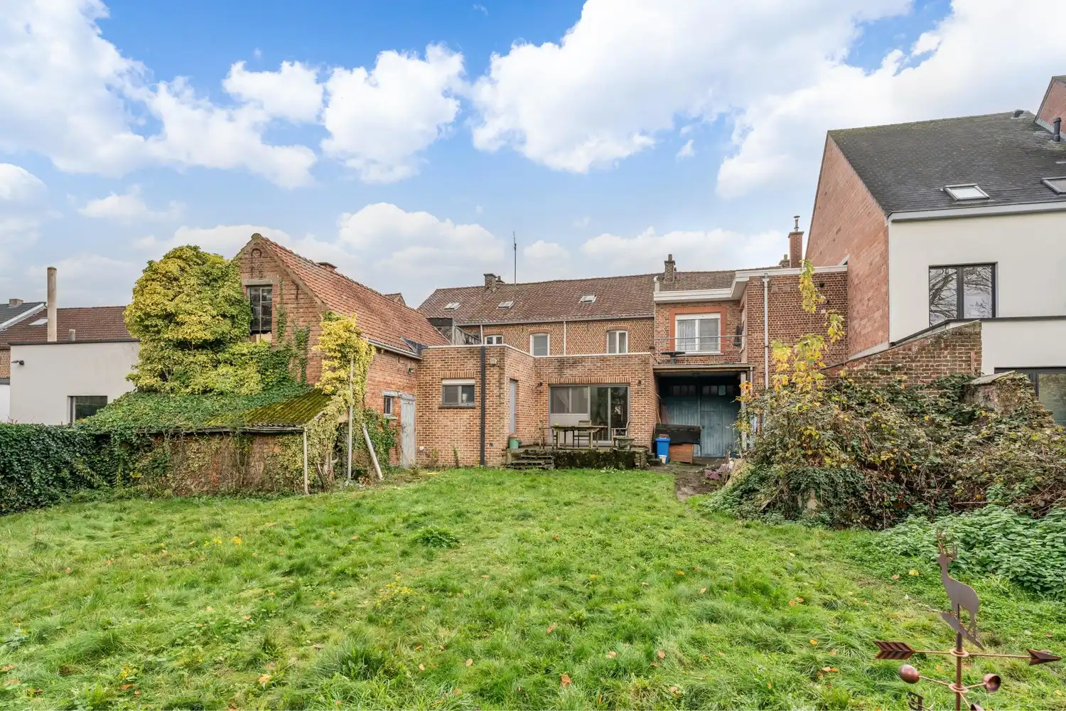 Ruime bel-etagewoning met grote garage (werkplaats) en dakterras foto 21