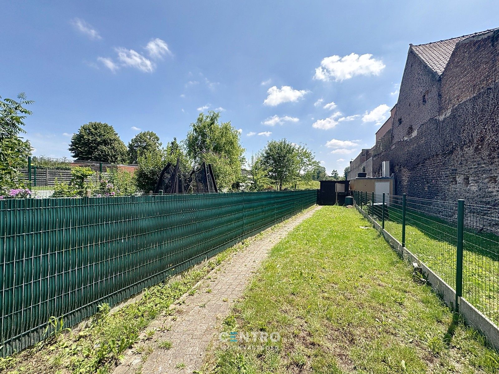 Ruime woning met 3 slpks met grote tuin en UITWEG ACHTERAAN! foto 19