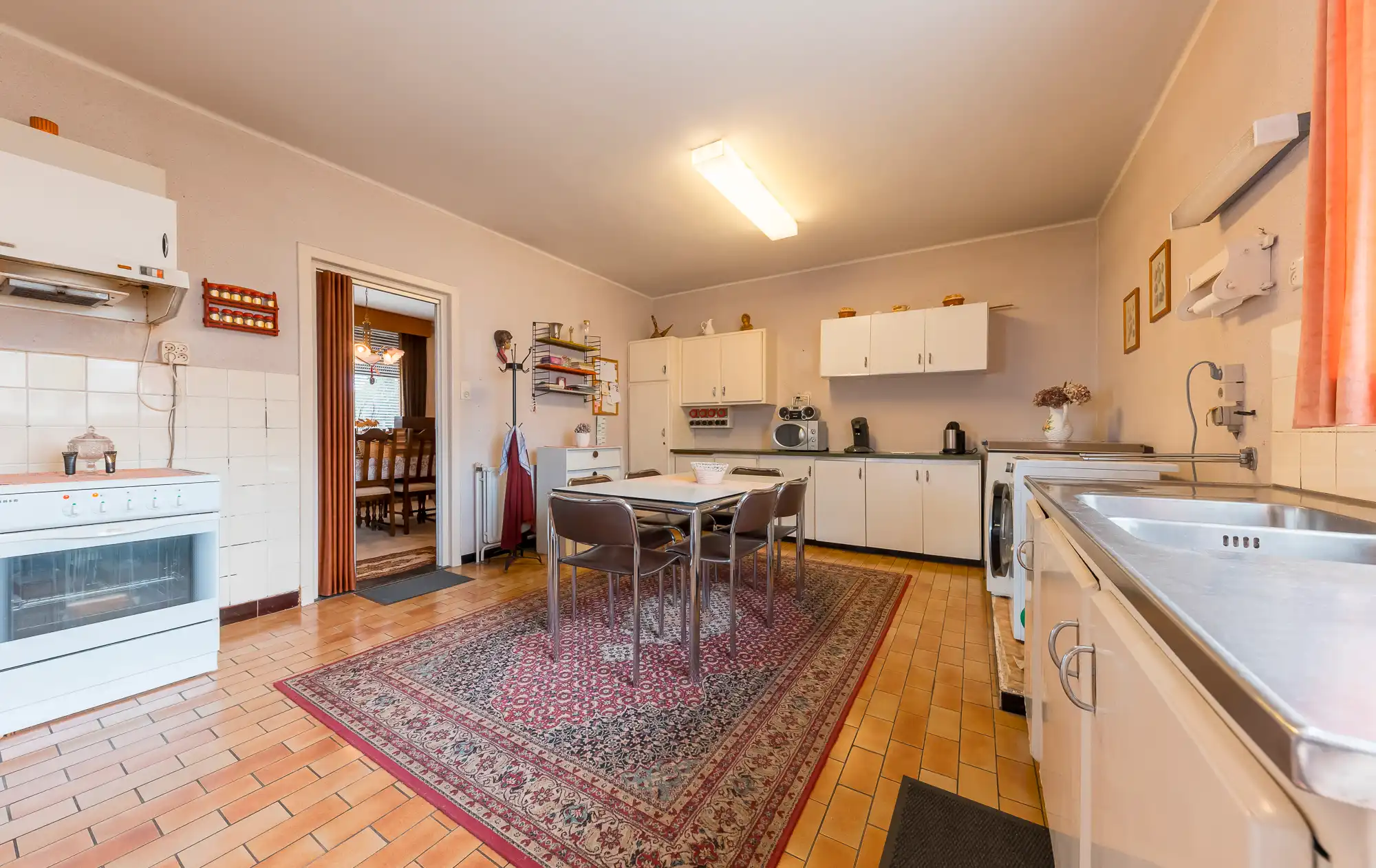 TE KOOP: Mooie op te frissen woning met 3 slaapkamers, garage en veel potentieel foto 12