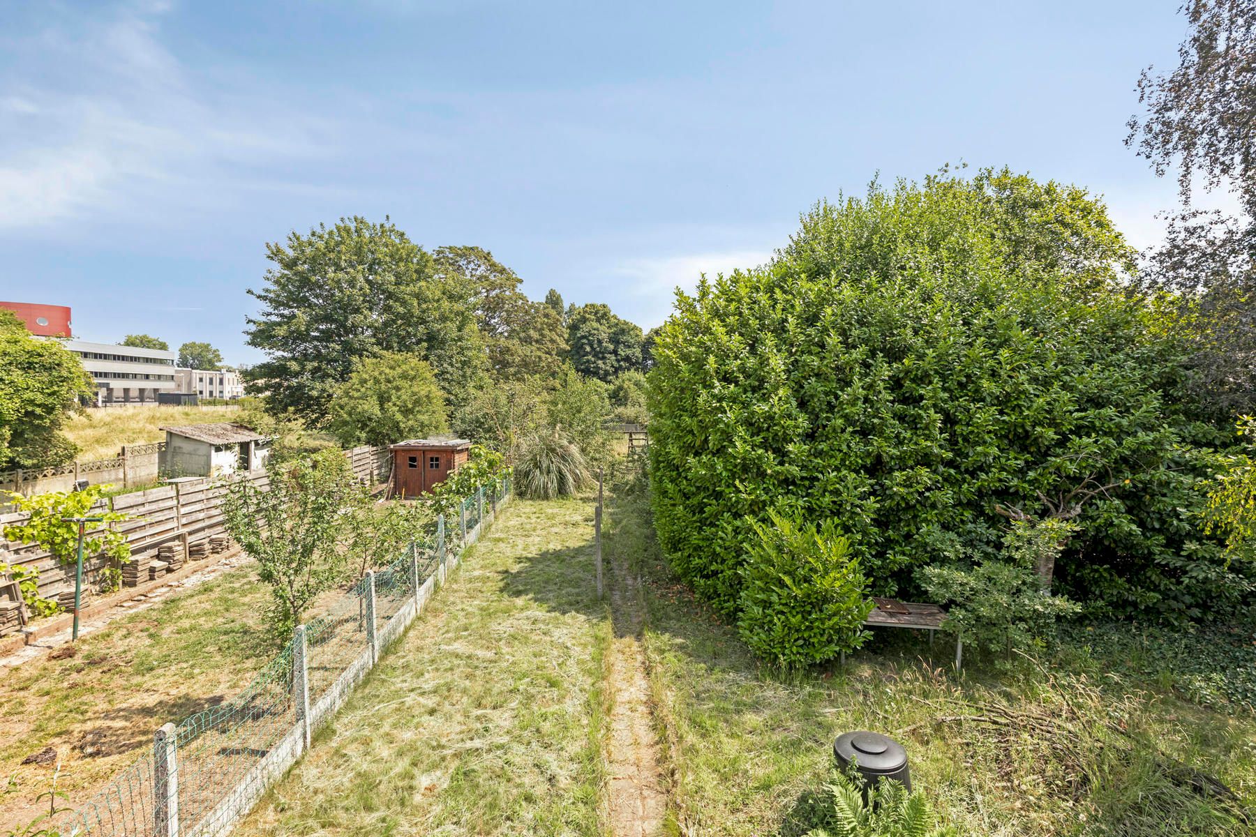 Charmante woning met naastgelegen bouwgrond foto 23
