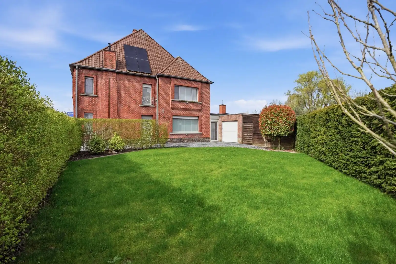 Grote halfopen woning met mogelijks 4 kamers, garage, zonnepanelen en tuin foto 41