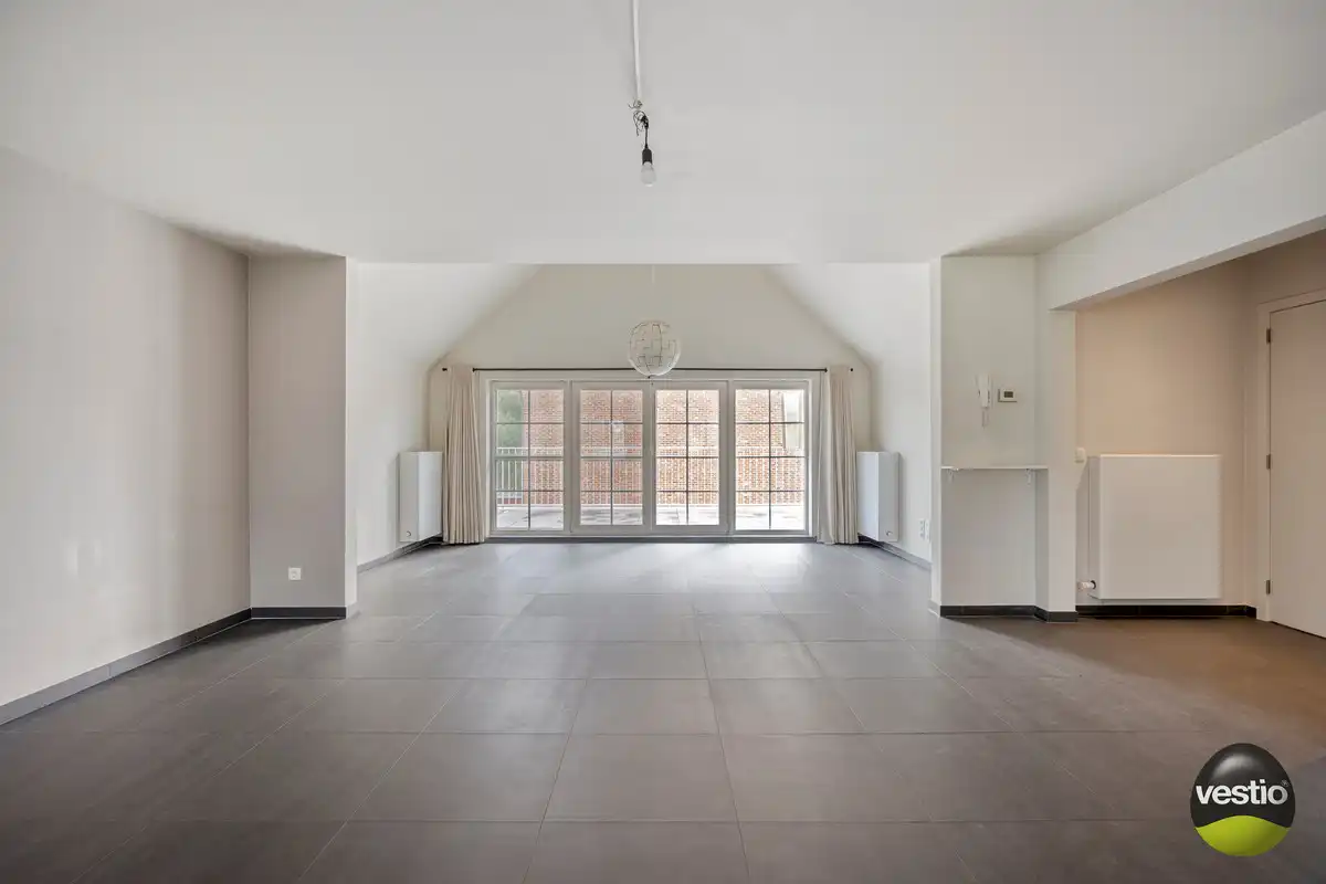 RUSTIG GELEGEN RUIME DUPLEX VAN 178M² NABIJ CENTRUM MUNSTERBILZEN. foto 2