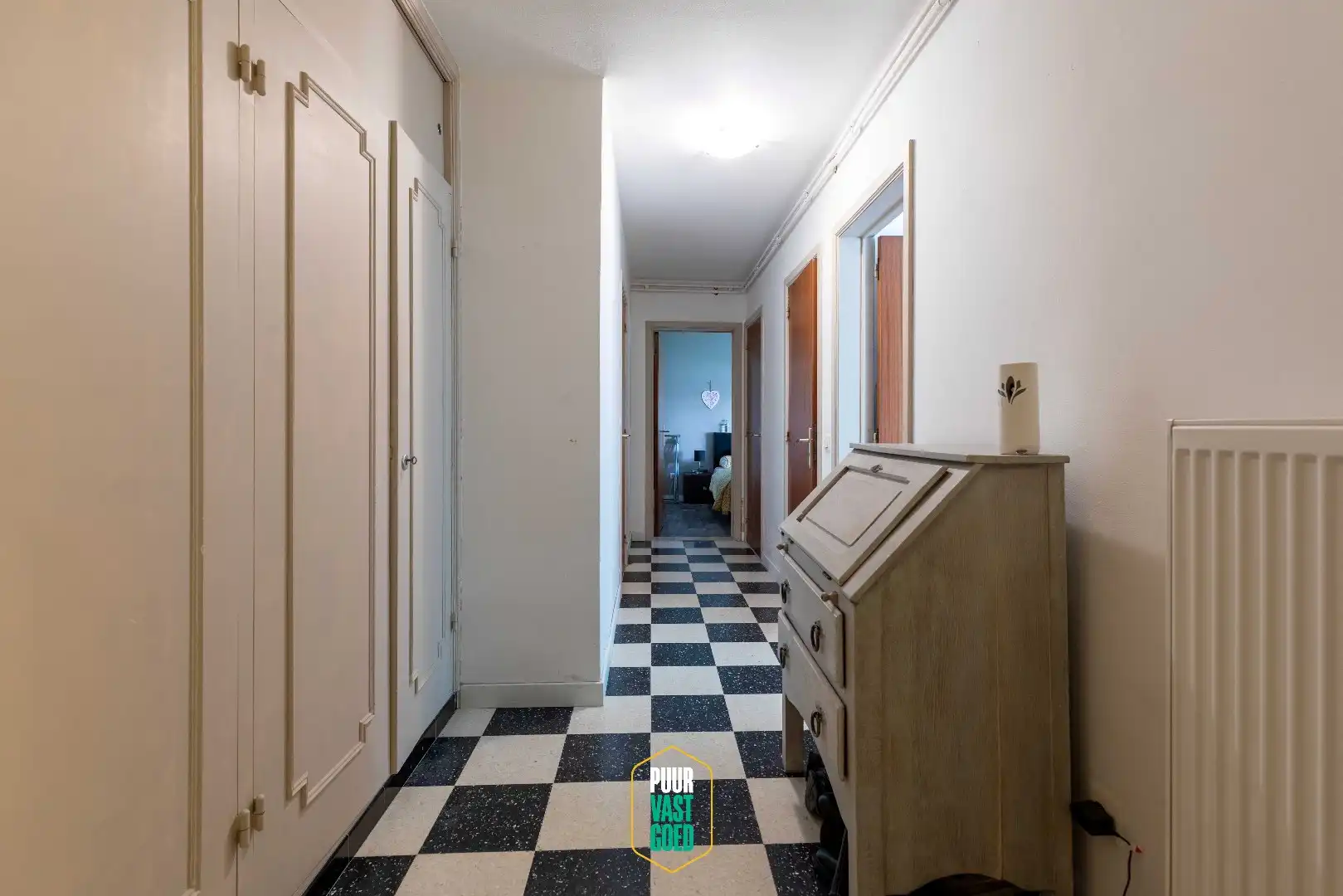 Ruim en verzorgd gelijkvloers appartement met terras foto 9
