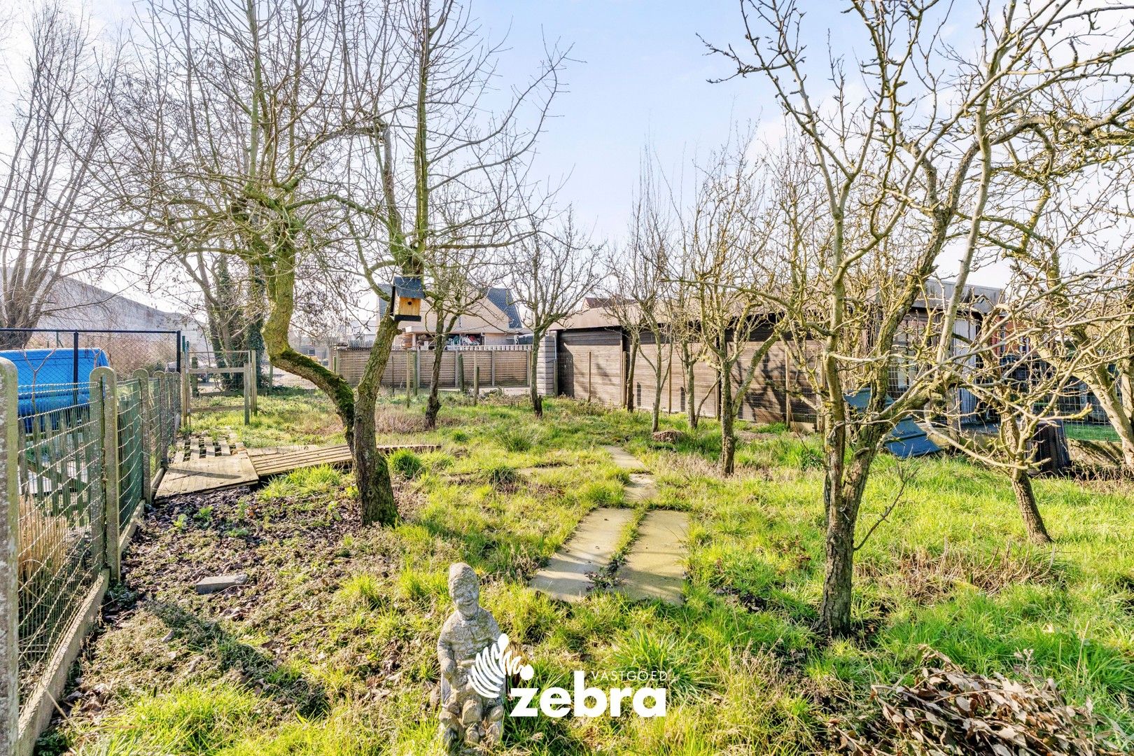 Charmante woning met drie slaapkamers en zuidgerichte tuin te Izegem! foto 24