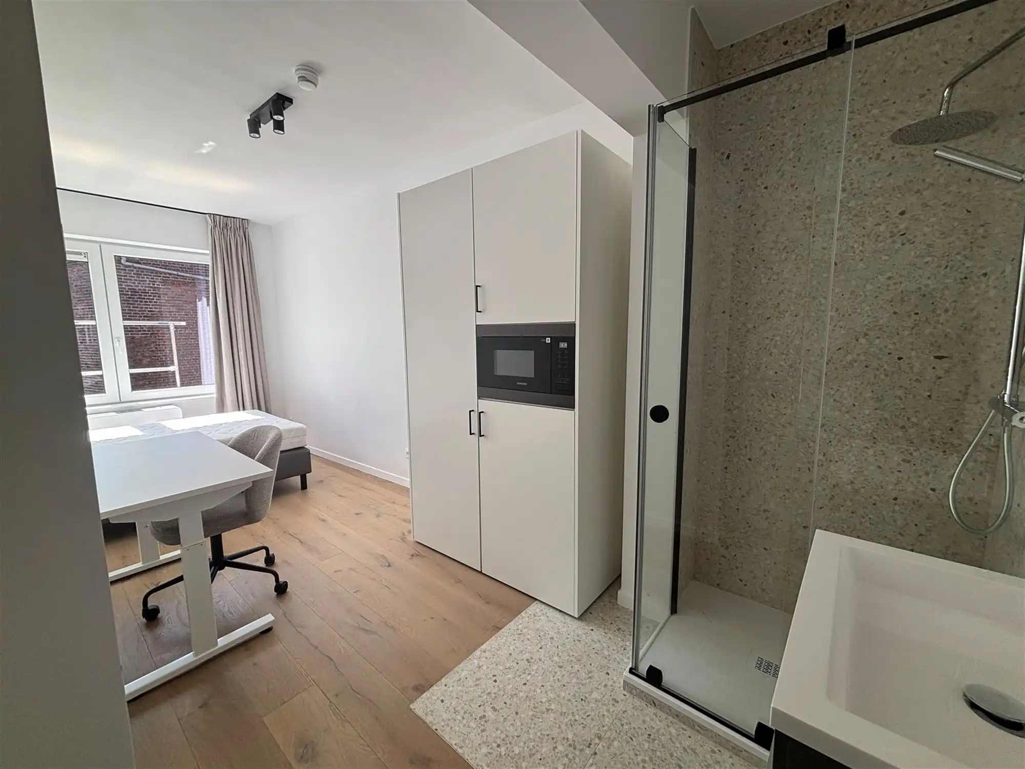 Moderne studentenkamer met airco foto 3