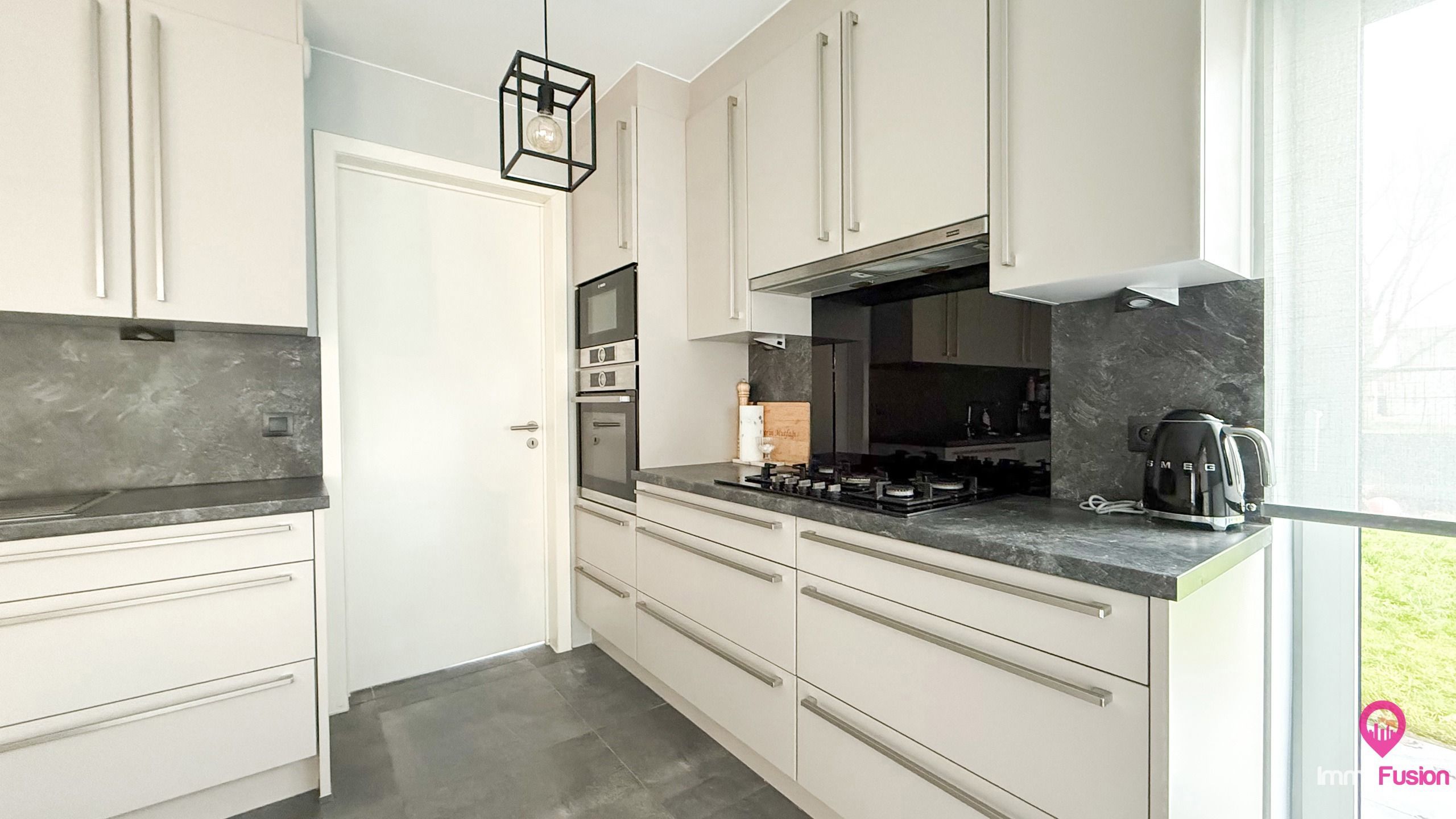 Recente halfopen woning met 2slpk en mooi tuin in Boekt! foto 11
