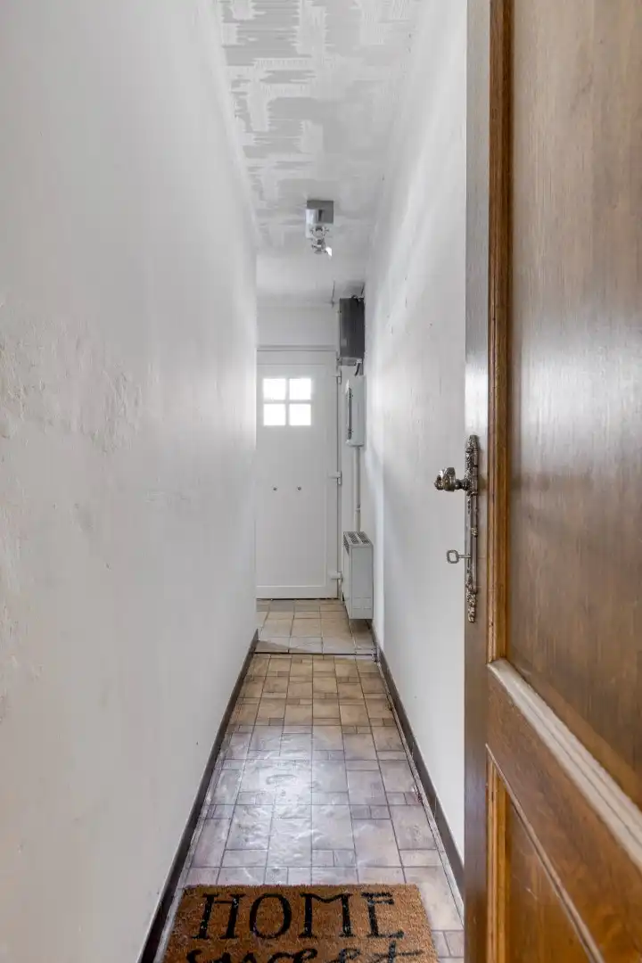 Gezellig ingerichte woning met hobbyruimte en tuin + toegang achterom foto 11