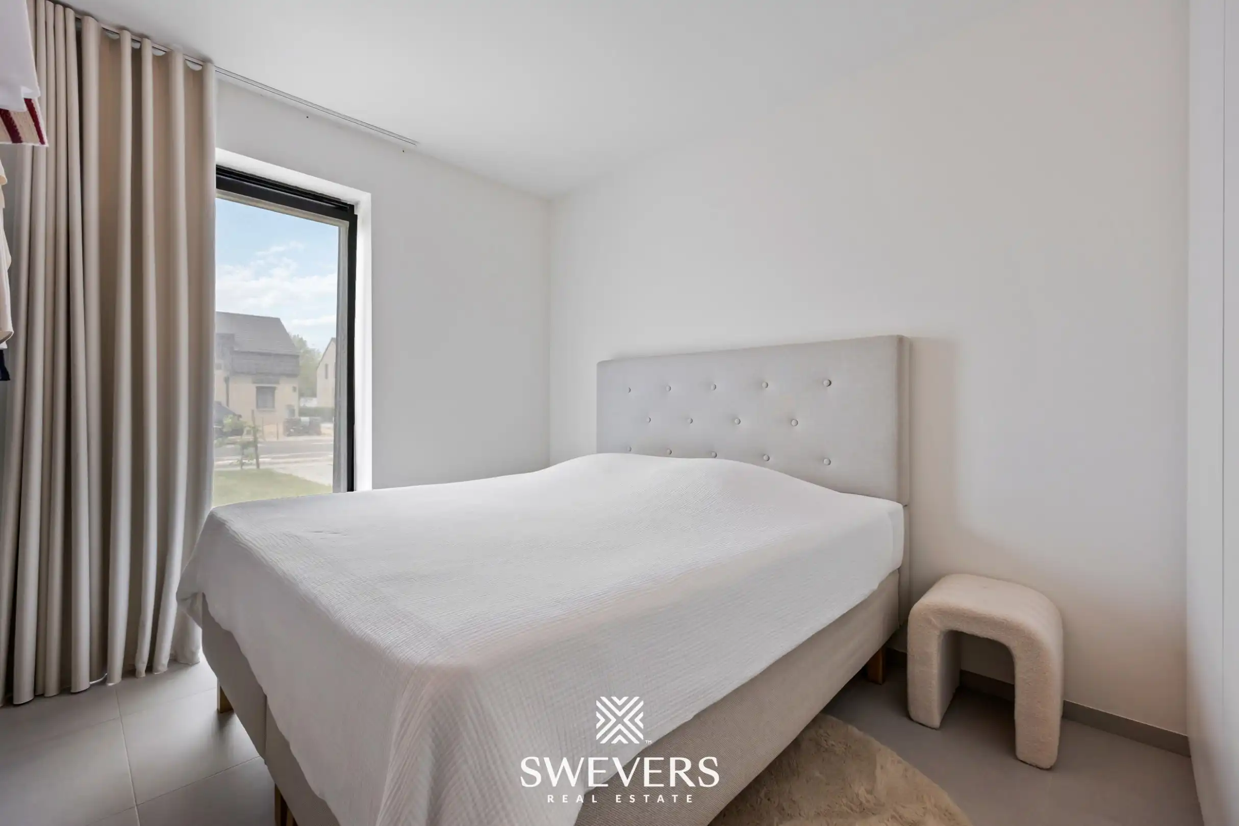 Nieuwbouwappartement met ruim terras, privétuin en ondergrondse staanplaats foto 11
