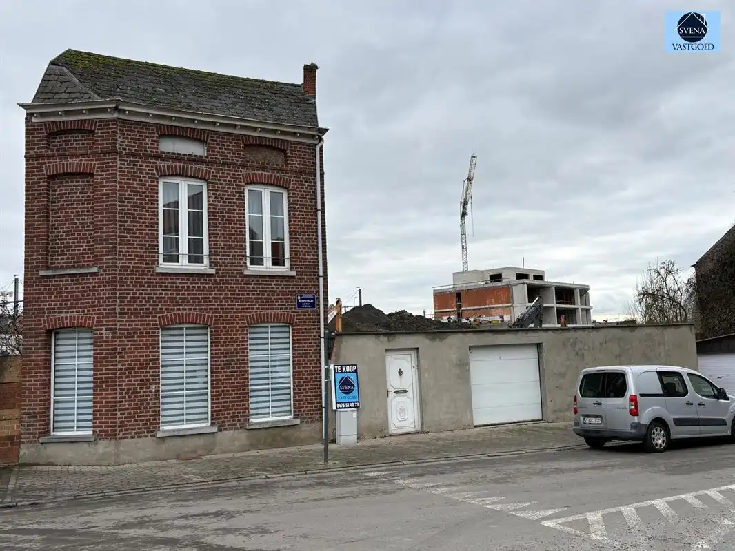 Hoofdfoto van de publicatie: ZEER GOED GELEGEN WONING NABIJ CENTRUM