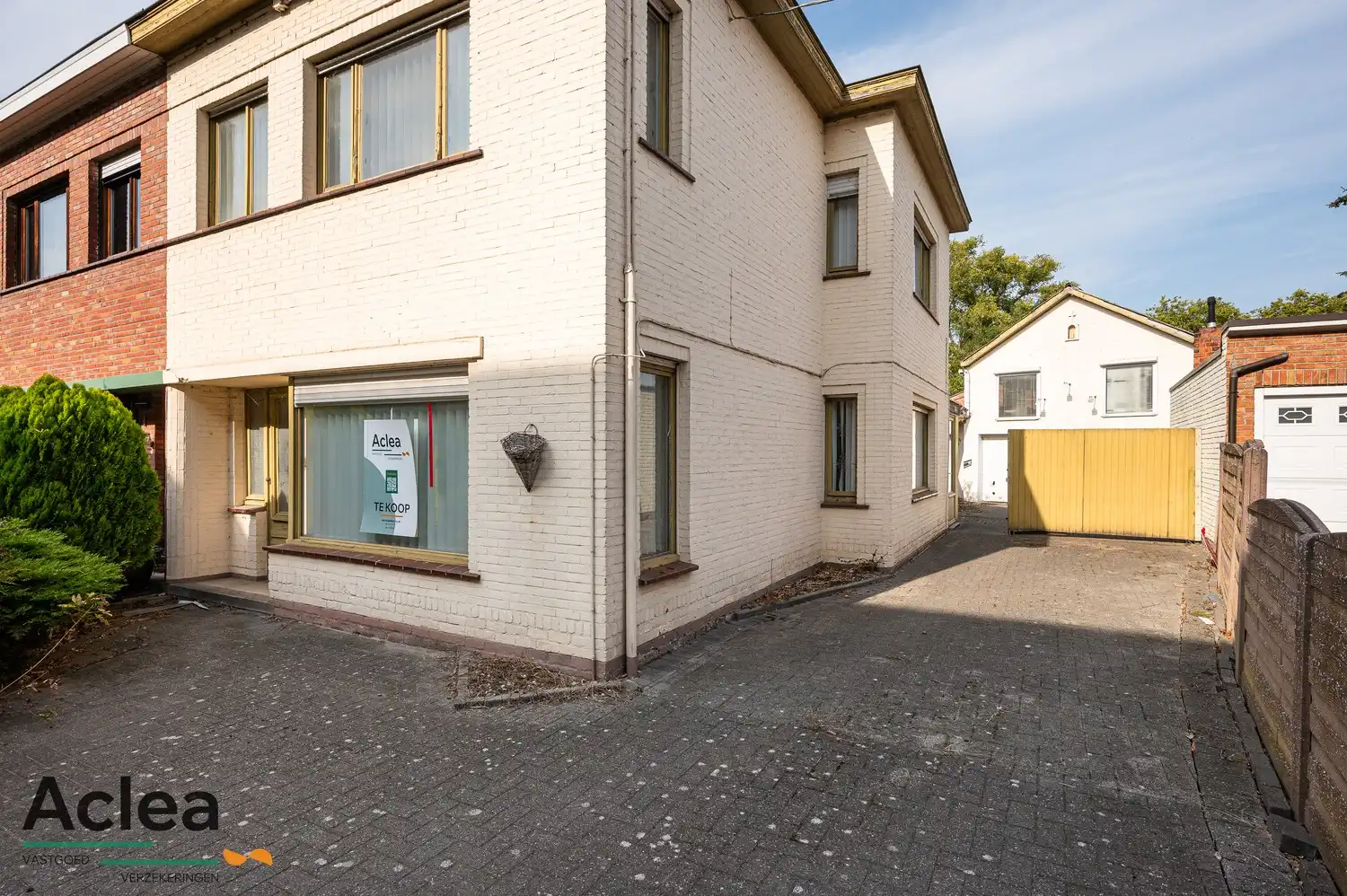 Te renoveren woning met grote magazijnruimte en veel potentieel foto 3