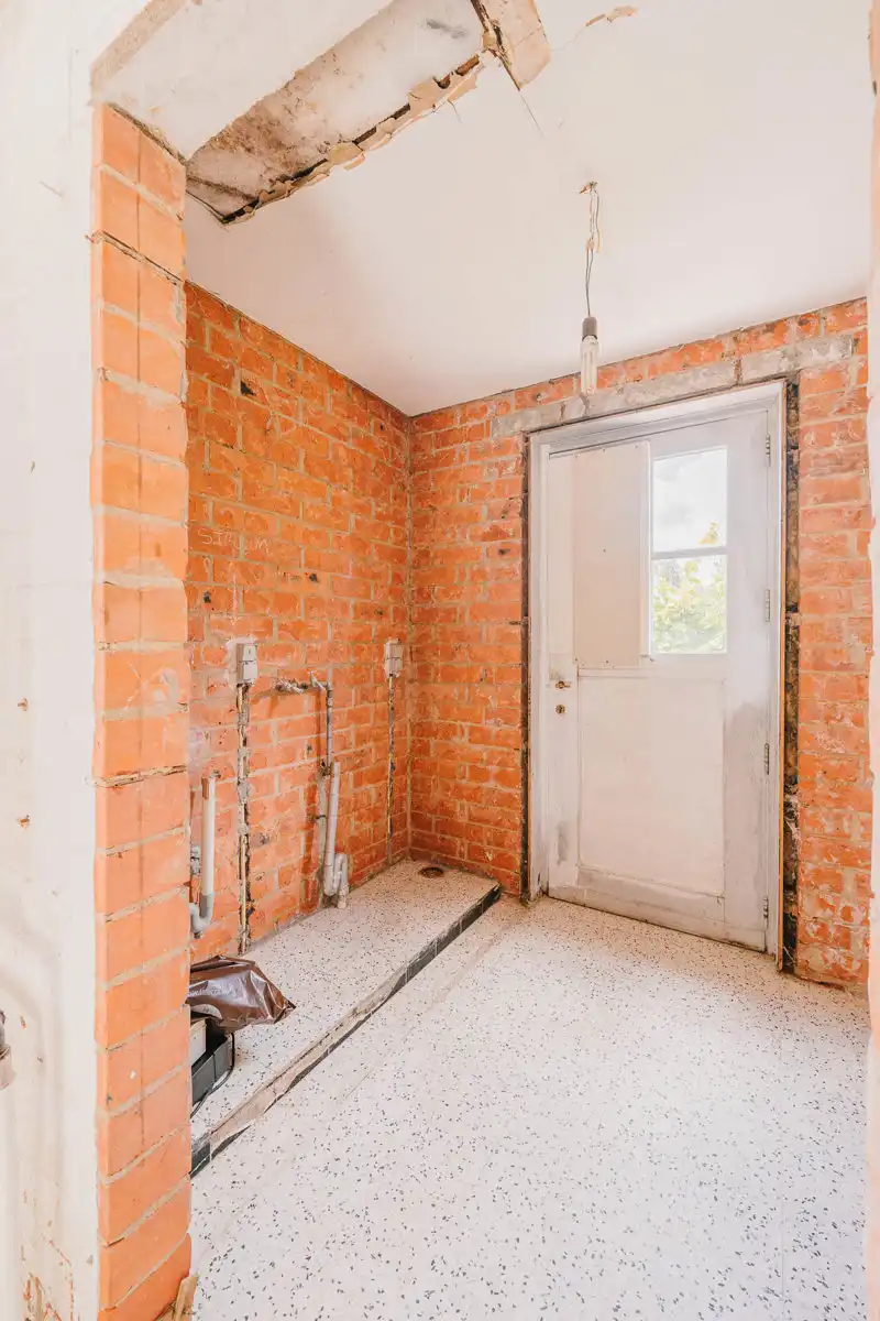 Gelijkvloerse renovatiewoning met groot potentieel foto 21