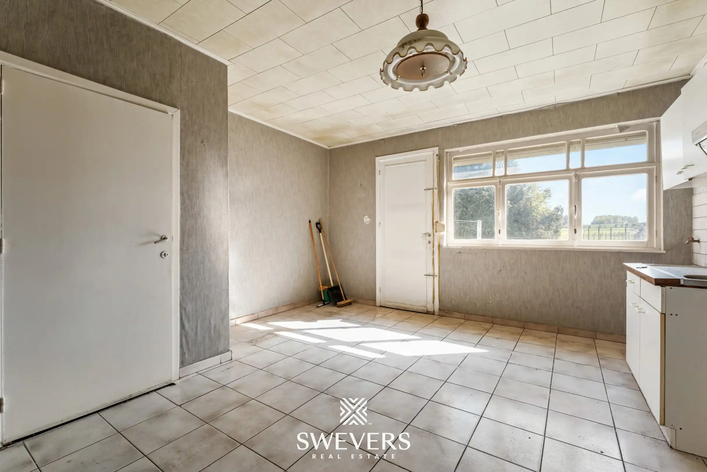 Te renoveren woning met 4 slaapkamers en prachtige tuin in Heers foto 5